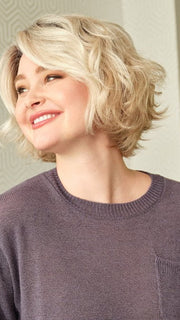 Model wearing GIA MONO by ENVY in PLATINUM SHADOW | Light Blonde with Dark Roots