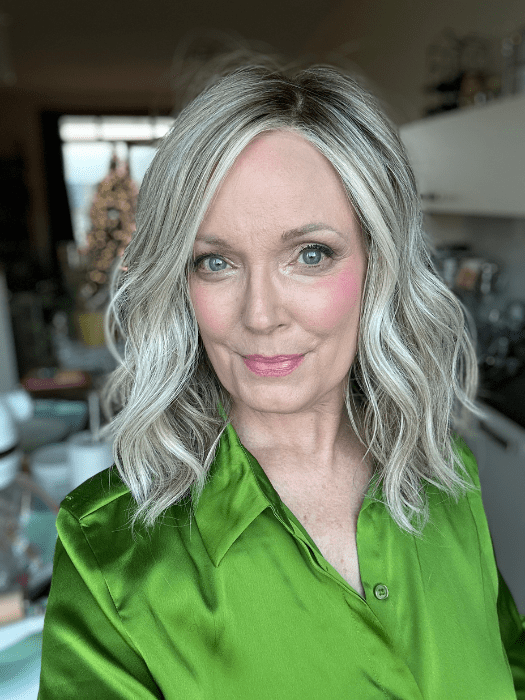 Mel B. @mels.be.ageless wearing WAVY DAY by RAQUEL WELCH WIGS in color RL17/23SS ICED LATTE MACCHIATO | Honey Blonde shaded with Cool Blonde and Dark Roots