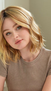 Model wearing CHARLOTTE by ENVY in BUTTERSCOTCH SHADOW | A blend of Strong, Golden Blonde and Light Blonde with Dark Brown Roots