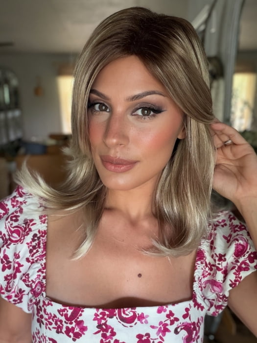 Roxie wearing HARLOW by NORIKO in MELTED-MARSHMALLOW | Subtly Warm Dark Sandy Blonde Blend with Medium Brown Roots and Light Ash Blonde Tips and Highlights