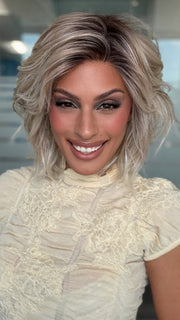 Roxie wearing BROADWAY by BELLETRESS in MILKSHAKE BLONDE R | A mixture of Light Sandy Brown, Highlighted with Light Ash Blonde with a Hint of Light Platinum Blonde with a Medium Root Color