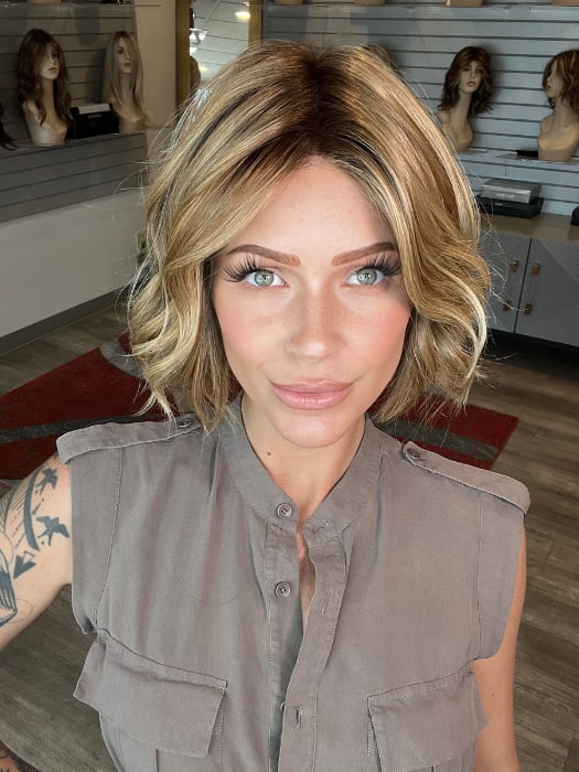 Madeline wearing AUSTEN by BELLETRESS in  CARAMEL TOFFEE BLONDE-R | Toffee is a warm, dimensional shade blending medium brown with golden blonde and caramel highlights. Softly rooted for a natural, sun-kissed finish.
