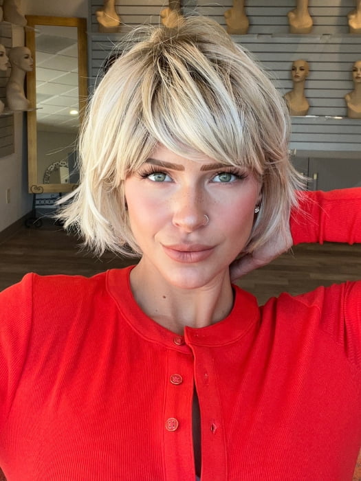 Madeline wearing TOLEDO by BELLETRESS in CRUSHED ALMOND BLONDE R | A soft Neutral Light Blonde with a Light and Medium Blended Root Color.