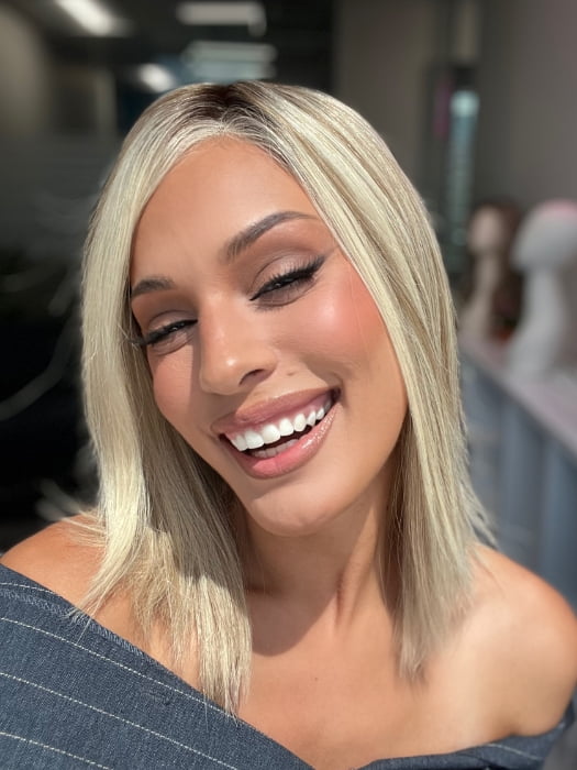 Roxie wearing CARRIE PETITE by JON RENAU in 101/88/27S8 CATALINA BLONDE | Pale blonde with Pure White Natural Violet halo highlights, shaded medium brown 