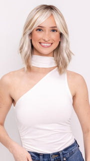 Ava wearing HOLLIE PETITE by JON RENAU in 101/88/27S8 CATALINA BLONDE | Pale blonde with Pure White Natural Violet halo highlights, shaded medium brown 