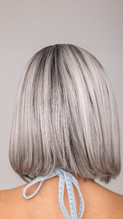ROXIE wearing CARLEY by ENVY in STERLING SHADOW | Medium Salt-and-Pepper Grey with Darker Brown Roots