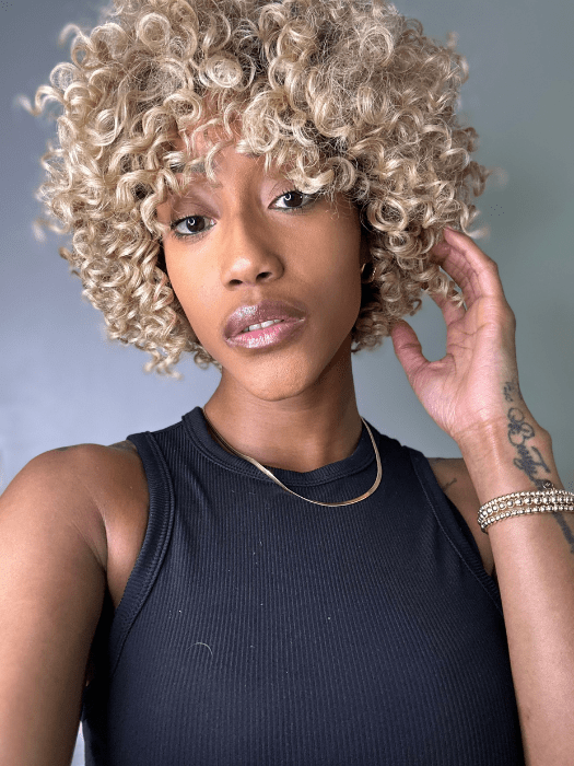 Seairra @seairrairving_ wearing ANIYAH by KIM KIMBLE in color MC25-88SS HONEY | Beige Blonde with a Darker Root