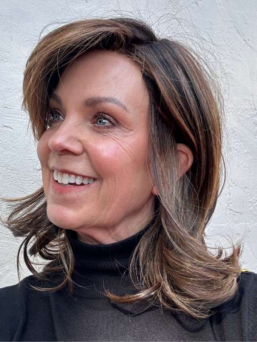 Susan Sparks @sparkles_intheworld wearing GODDESS by RAQUEL WELCH WIGS in color RL8/29SS SHADED HAZELNUT | Warm Medium Brown Evenly Blended with Ginger Blonde with Dark Roots