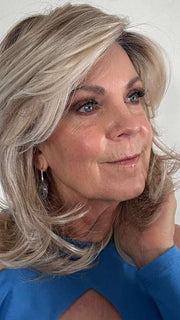 Susan Sparks @sparkles_intheworld wearing GODDESS by RAQUEL WELCH WIGS in color RL19/23SS SHADED BISCUIT | Light Ash Blonde Evenly Blended with Cool Platinum Blonde and Dark Roots