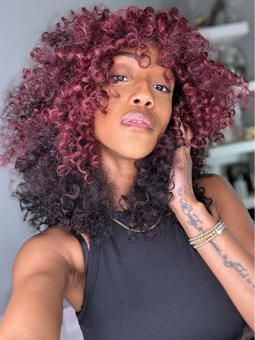 Seairra @seairrairving_ wearing MAKAYALA by KIM KIMBLE in color MC4/35SS SANGRIA | Dark Rooted Red with Fiery Red Highlights