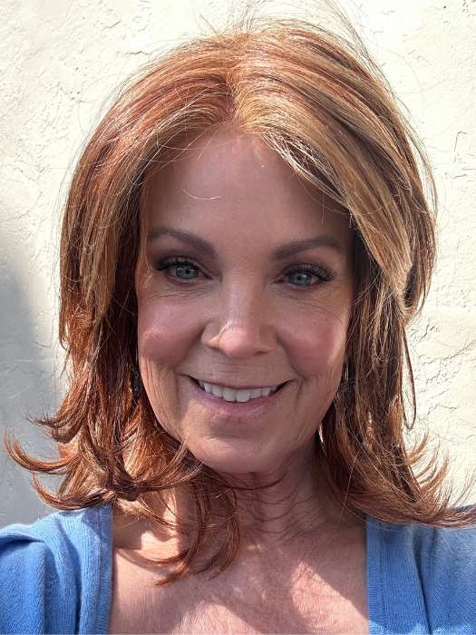 Susan Sparks @sparkles_intheworld wearing GODDESS by RAQUEL WELCH WIGS in color RL31/29 FIERY COPPER | Medium Light Auburn Evenly Blended with Ginger Blonde