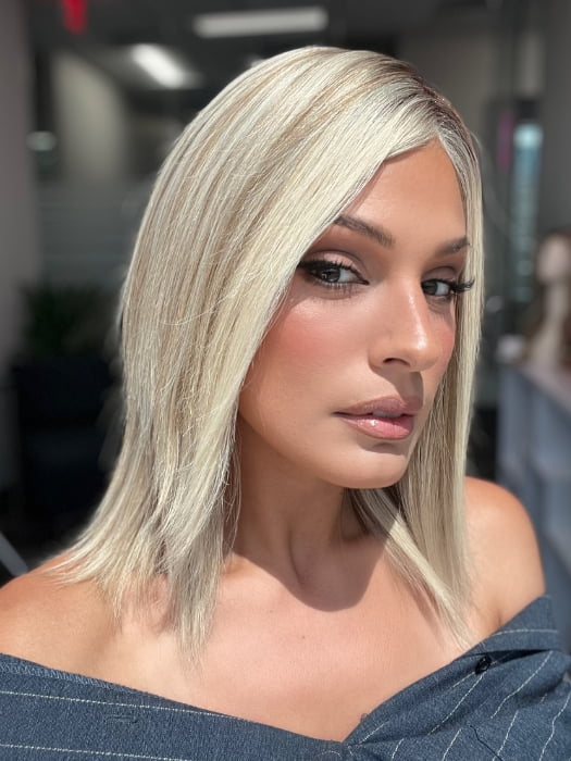 Roxie wearing CARRIE PETITE by JON RENAU in 101/88/27S8 CATALINA BLONDE | Pale blonde with Pure White Natural Violet halo highlights, shaded medium brown 