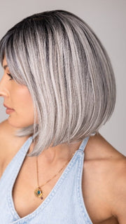 ROXIE wearing CARLEY by ENVY in STERLING SHADOW | Medium Salt-and-Pepper Grey with Darker Brown Roots