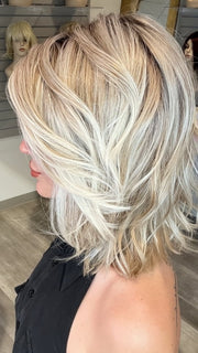 Madeline wearing PARK AVE by BELLETRESS in MILKSHAKE BLONDE R | A mixture of Light Sandy Brown, Highlighted with Light Ash Blonde with a Hint of Light Platinum Blonde with a Medium Root Color
