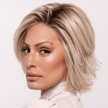 Roxie wearing ALICANTE by BELLETRESS in CRUSHED ALMOND BLONDE R | A soft Neutral Light Blonde with a Light and Medium Blended Root Color.
PPC MAIN IMAGE