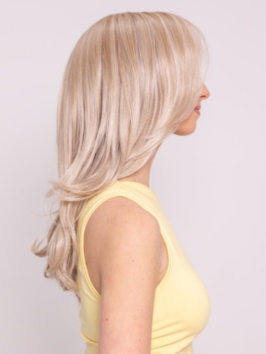 Ava wearing Brooklyn by Belletress in CRUSHED ALMOND BLONDE R | A soft Neutral Light Blonde with a Light and Medium Blended Root Color.