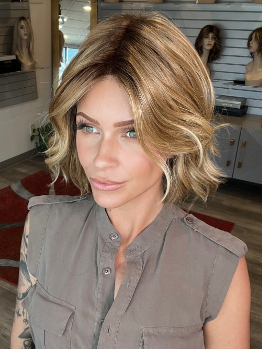 Madeline wearing AUSTEN by BELLETRESS in  CARAMEL TOFFEE BLONDE-R | Toffee is a warm, dimensional shade blending medium brown with golden blonde and caramel highlights. Softly rooted for a natural, sun-kissed finish.