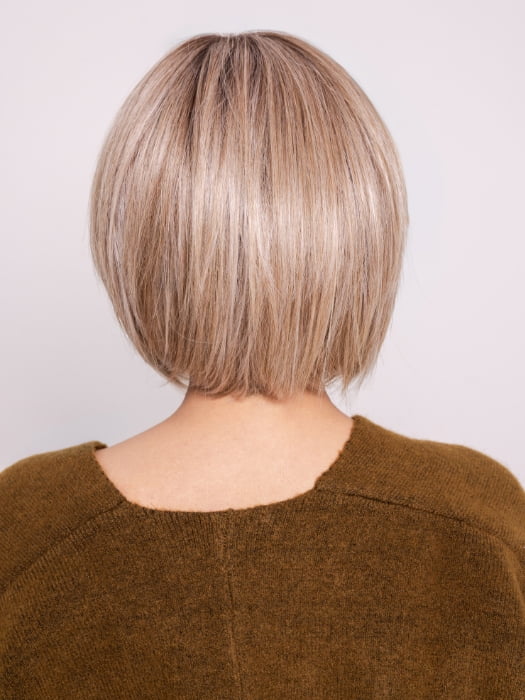 Roxie wearing BECKHAM by BELLETRESS in BUTTERCAKE BLONDE-R | A neutral-warm blonde blend featuring light brown, ash, and lightest blonde tones with natural-looking darker roots for added depth and realism.