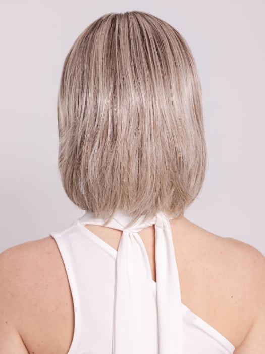 Ava wearing WINTOUR by BELLETRESS in COOL CHAI BLONDE-R | A balanced cool blonde with softly contrasted darker roots, a fresh twist on classic blonde tones.