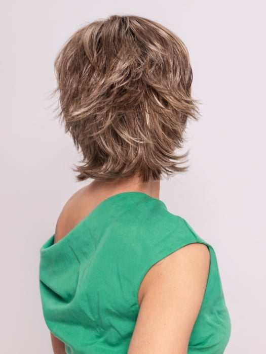 Roxie wearing TREND SETTER by RAQUEL WELCH in SS12/22 SHADED CAPPUCCINO | Light Golden Brown Evenly Blended with Cool Platinum Blonde Highlights and Dark Roots