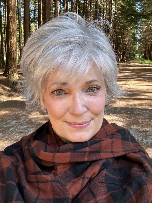 Mel B. @mels.be.ageless wearing VOLTAGE PETITE by RAQUEL WELCH WIGS in color RL51/61 ICED GRANITA | Lightest Grey Progresses to a Deep Grey at the Nape
