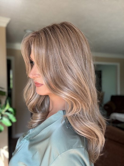 Sandy wearing ROBERTS by BELLETRESS in BUTTERCAKE BLONDE-R | A neutral-warm blonde blend featuring light brown, ash, and lightest blonde tones with natural-looking darker roots for added depth and realism.