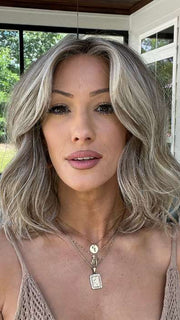 Jenna Fail @jenna_fail wearing PEERLESS 14 by BELLETRESS in color ROOTBEER FLOAT BLONDE | A Blend of Light Pearl Blonde, Ash Blonde, Beige Blonde, Champagne Blonde, and Platinum Blonde with a Light and Medium Brown Root