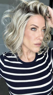 Kristyna Moore @kristynamoore wearing DIRECTOR'S PICK by RAQUEL WELCH WIGS in color RL19/23SS SHADED BISCUIT | Light Ash Blonde Evenly Blended with Cool Platinum Blonde with Dark Roots (window lighting)