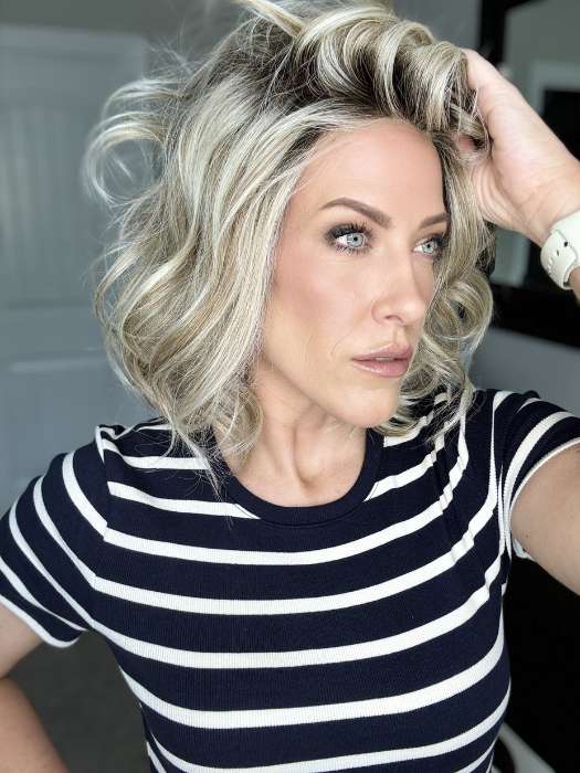 Kristyna Moore @kristynamoore wearing DIRECTOR'S PICK by RAQUEL WELCH WIGS in color RL19/23SS SHADED BISCUIT | Light Ash Blonde Evenly Blended with Cool Platinum Blonde with Dark Roots (window lighting)