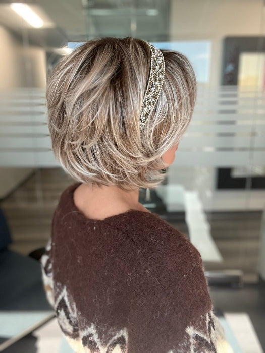 ROXIE wearing ZEAL by NORIKO in MELTED-MARSHMALLOW | Subtly Warm Dark Sandy Blonde Blend with Medium Brown Roots and Light Ash Blonde Tips and Highlights