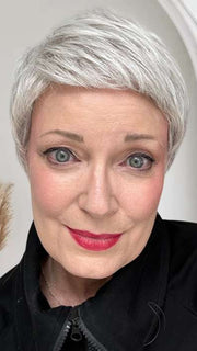Mel B. @mels.be.ageless wearing STRAIGHT CHIC by RAQUEL WELCH WIGS in color RL56/60 SILVER MIST | Lightest Grey Evenly Blended with Pure White
