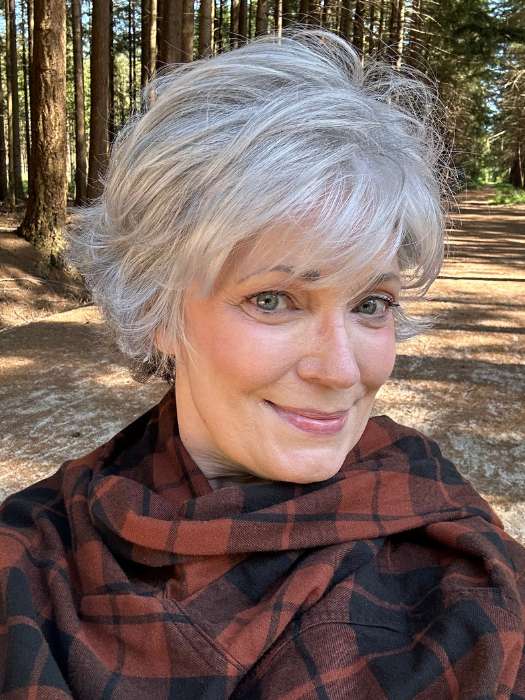 Mel B. @mels.be.ageless wearing VOLTAGE PETITE by RAQUEL WELCH WIGS in color RL51/61 ICED GRANITA | Lightest Grey Progresses to a Deep Grey at the Nape