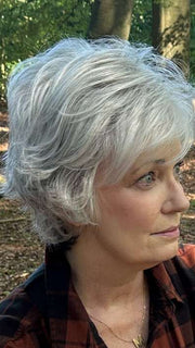 Mel B. @mels.be.ageless wearing VOLTAGE PETITE by RAQUEL WELCH WIGS in color RL51/61 ICED GRANITA | Lightest Grey Progresses to a Deep Grey at the Nape