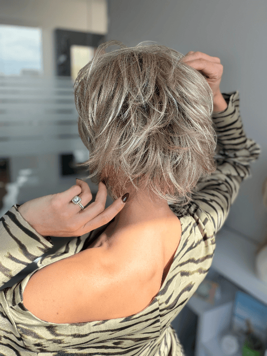 Model is wearing SKY in EXCLUSIVE COLOR ARABIAN SAND™ | Neutral Chocolate Brown Roots fade into a Neutral Blonde Base, blended with Sandy, Chestnut, Golden, and Honey Blondes, with Soft Creamy Blonde Highlights and Face-Framing Lowlights