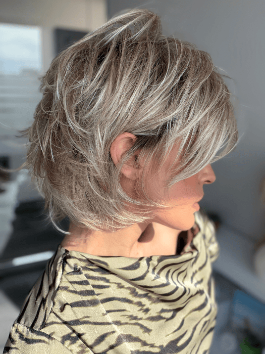 Model is wearing SKY in EXCLUSIVE COLOR ARABIAN SAND™ | Neutral Chocolate Brown Roots fade into a Neutral Blonde Base, blended with Sandy, Chestnut, Golden, and Honey Blondes, with Soft Creamy Blonde Highlights and Face-Framing Lowlights