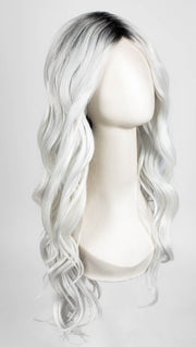 Model is wearing ETHEREAL ICE | Natural dark roots melt into an icy white shade for a beautiful contrast. 
