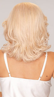 Roxie wearing CLARA by RENE OF PARIS in SNOWY-PEACH | A combination of Pale Peach and Platinum Blond