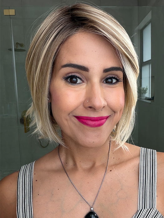 Lorena @faux.hurr.lifee wearing ALICANTE by BELLE TRESS in color RAW SUGAR BLONDE | A Neutral Light Blonde, Honey Blonde, Pale Gold Blonde, with a base of Light Brown Low Lights featuring a Medium Root Color