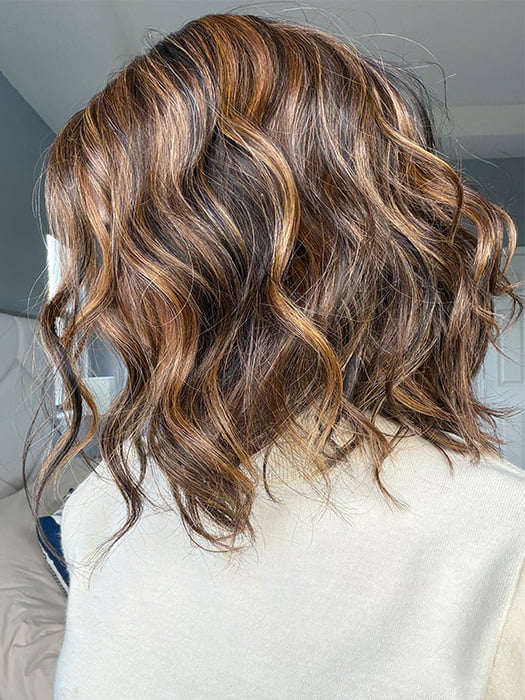 Lorena @faux.hurr.lifee wearing ANDIE by BELLE TRESS in color PEANUT BUTTER CHOCOLATE R | Velvety Chocolate Brown Roots that seamlessly transition into Warm, Golden Peanut Butter Tones, creating a luscious, sunlit effect with hints of Caramel and Honey hues woven throughout