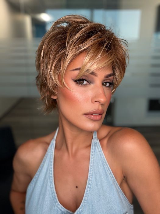 Roxie is wearing AVENUE SOFT by ELLEN WILLE in LIGHT BERNSTEIN ROOTED 12.26.27 | Lightest Brown, Light Golden Blonde, and Dark Strawberry Blonde Blend with Shaded Roots