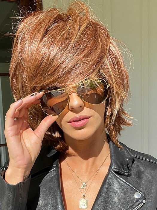 Jenna wearing BLACK TIE CHIC by RAQUEL WELCH in RL31/29 FIERY COPPER | Medium Light Auburn Evenly Blended with Ginger Blonde