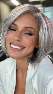 Model is wearing SAGE by ESTETICA in color R51LF60 | Off Black with 75% Grey Lightening to Gold Blonde Mix in Front