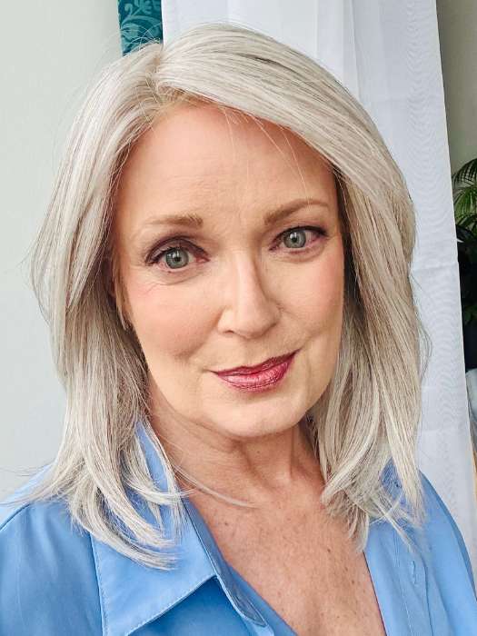 Mel B. @mels.be.ageless wearing PRETTY PLEASE! by RAQUEL WELCH in color RL56/60 SILVER | Lightest Gray Evenly Blended with Pure White