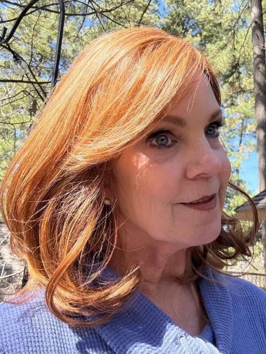 Susan @an_affair_with_hair wearing CURVE APPEAL by RAQUEL WELCH in color RL30/27 RUSTY AUBURN | Medium Auburn Evenly Blended with Strawberry Blonde
