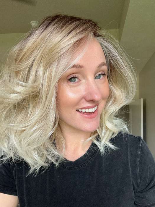 Carlyn @carlynwilson84 wearing ROHAN by AMORE in color MELTED SAND | MELTED SAND | Rich, warm brown root melts into the neutral blond tone. Light-beige blond ends complete this stunning color.
