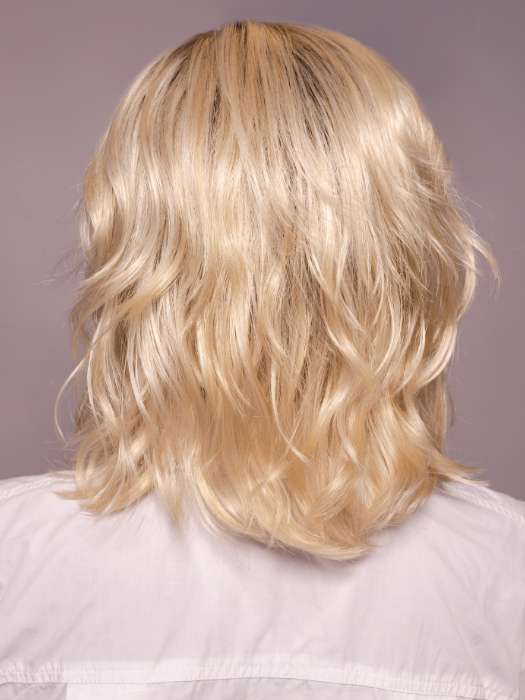 Model is wearing MELLOW by ESTETICA in shade SPF BLONDE | Golden Blonde, Pale Blonde, Iced Blonde Blended with Soft Brown Roots