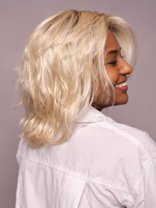 Model is wearing MELLOW by ESTETICA in shade SPF BLONDE | Golden Blonde, Pale Blonde, Iced Blonde Blended with Soft Brown Roots