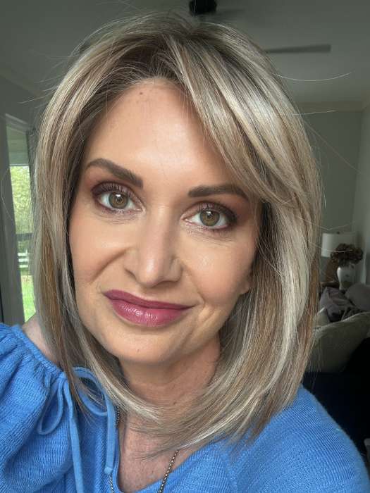 Emily H. @she_sheds_more wearing STRAIGHT TO CAMERA by RAQUEL WELCH in color RL19/23SS SHADED BISCUIT | Light Ash Blonde Evenly Blended with Cool Platinum Blonde with Dark Roots