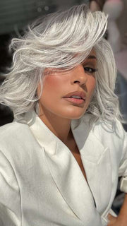 Model is wearing FLIRT ALERT by RAQUEL WELCH in color RL56/60 SILVER MIST | Lightest Gray Evenly Blended with Pure White