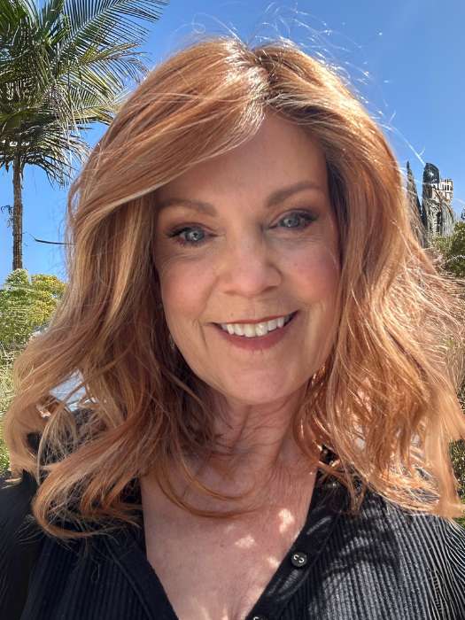 Susan Sparks @sparkles_intheworld wearing WAVY DAY by RAQUEL WELCH in shade RL29/33SS ICED PUMPKIN SPICE | Strawberry Blonde Shaded with Dark Red-Brown